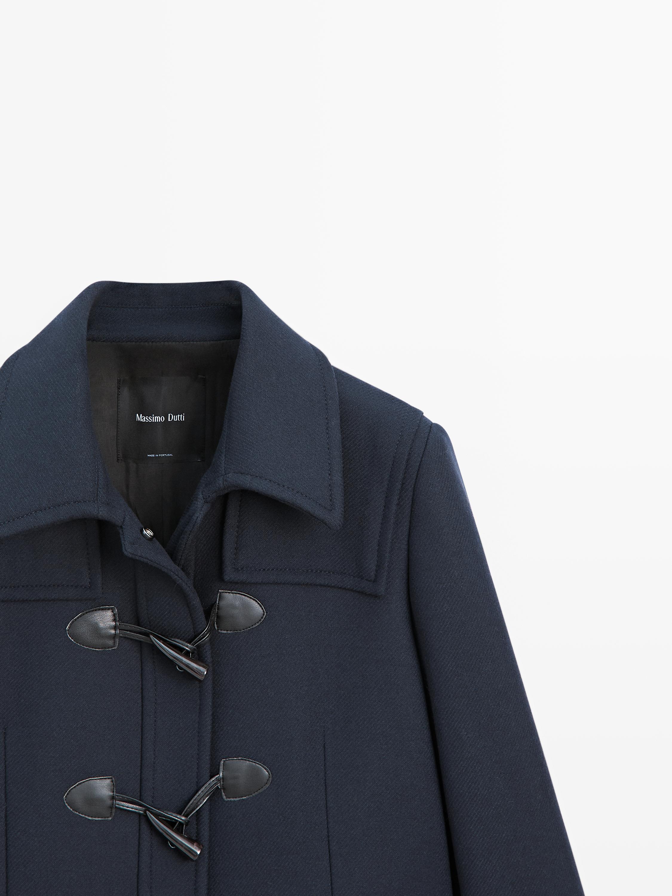 Manteau long à brandebourgs